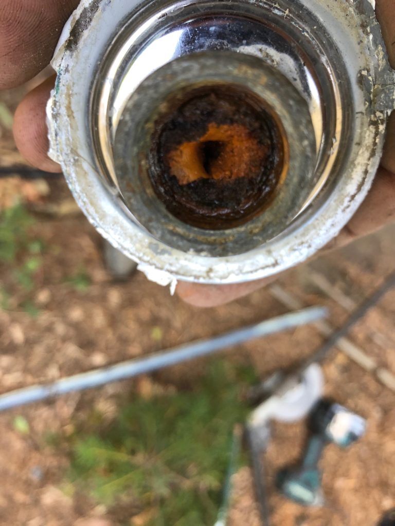 Corroded galvanised pipe.
