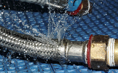 What happens when a flexible hose bursts?